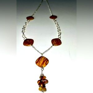 Handmade necklace with sandstone and tigers eye. 24” + 3” drop.